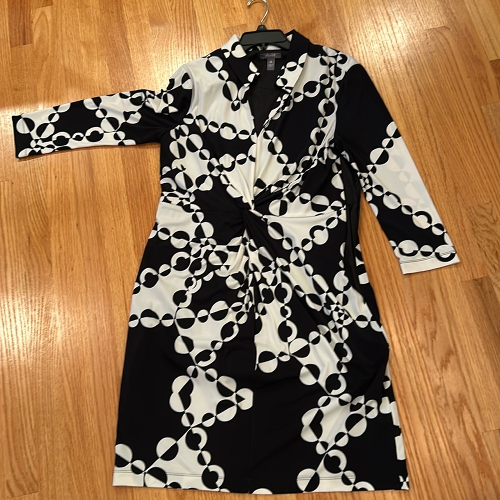 Muse dress size 14. Twist detail at waist.  Black and cream